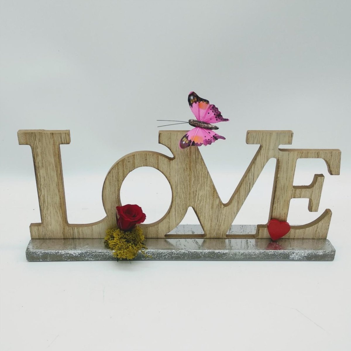 Home/Love de madera con rosa eterna Floreate